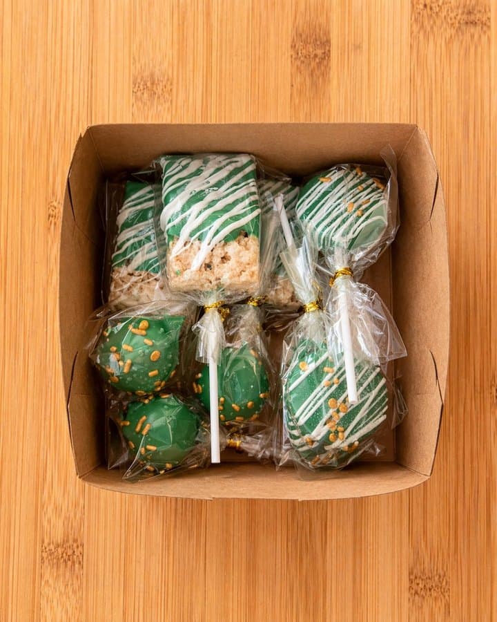 Green themed gift box with cake pops