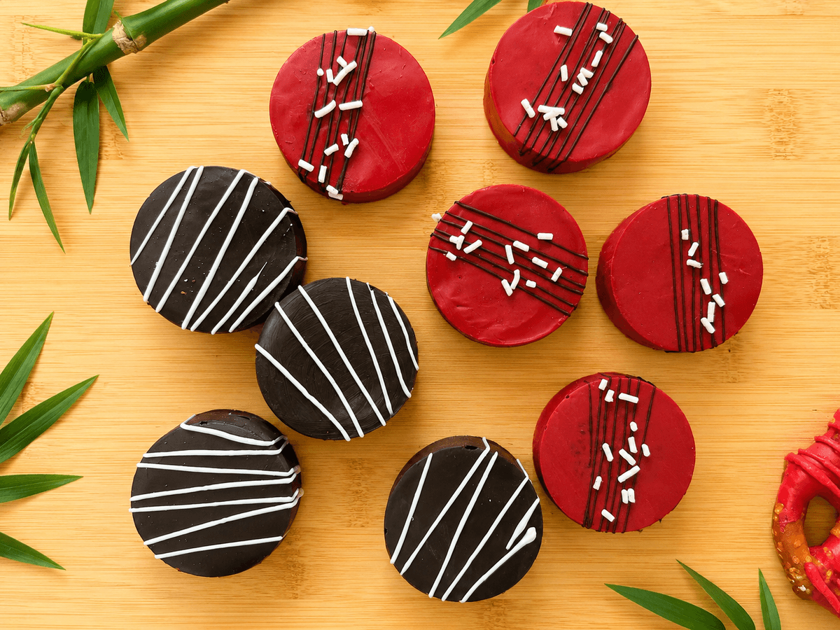 Custom dipped Oreos in red and black corporate colors